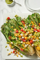 Summer cos lettuce salad with tomatoes, sweetcorn and feta cheese