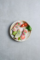 Rice paper rolls with fruit and mint