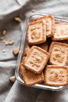 Sugar printed cookies in a glass container