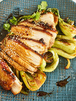 Strips of pork belly with coriander, chilli and bok choy