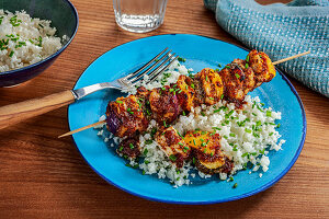 Chicken and bacon skewers with cauliflower rice