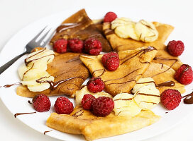 Crepes with raspberries and bananas