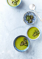 Cream of vegan Kale-Broccoli Soup with Kale Chips. Seen from above
