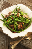 Beans, peas, mushrooms and walnuts with parsley dressing