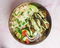 Lamb meatballs curry with rice and vegetables