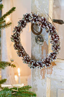 DIY Christmas wreath made of birch bark and pine cones