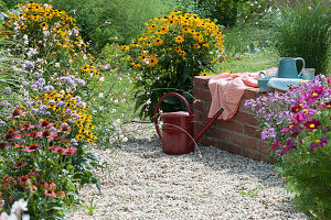 Small gravel terrace on the flowering perennial border