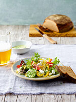 Summer salad with three kinds of cheese and beer bread