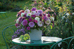 Lush bouquet of dahlias, zinnias, knotweed and feather bristle grass