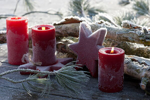 Candles and star in the hoarfrost