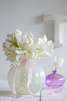 Vase of white parrot tulips