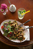 Fried cauliflower and mushrooms with a side salad