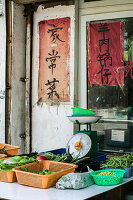 Chinese market stall of green vegetables