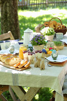 A covered easter table in a garden