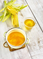 Corn tea in a pot and glass
