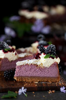 A slice of blackberry cheesecake