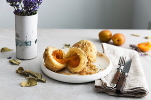 Apricot dumplings with buttered crumbs