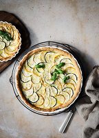 Zucchini tart with cheese and basil