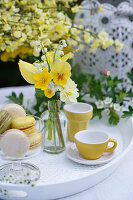 Posy of violas, buttercups, lily-of-the-valley, tulip and primulas