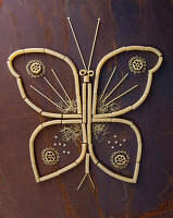 A butterfly made from raw pasta shapes