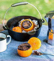 Campfire orange cakes baked in a Dutch oven