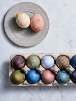 Tray of eggs dyed in different colors for Easter