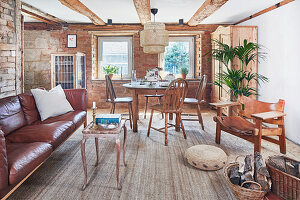 Vintage leather furniture in the living room with exposed brickwork