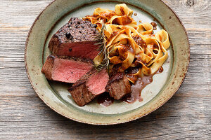 Venison steaks with fettuccine