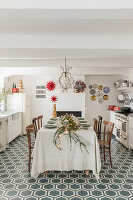 Vintage-style dining table with Christmas decorations