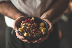 Oats bowl, breakfast, toasted almonds, raspberries, pineapple, grapes, sunflower seeds, chia seeds, linseed