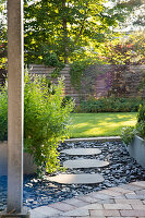 Garden path with slate slabs surrounded by diabase