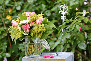 Summer bouquet of hydrangeas, lady's mantle and roses