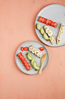 Colourful bread fingers with strawberries, avocado and banana