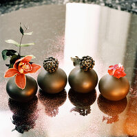 Tabletop with vases and flower display