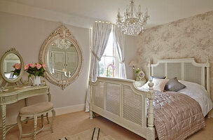 Bedroom with double bed and dressing table in French style