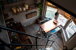 View from above of rustic kitchen with dining area