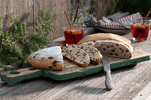 Christmas stollen on wooden cutting board