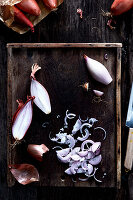 Shallots in a rustic wooden box