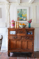 Antique china cupboard in rustic kitchen