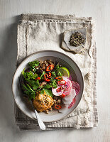 Hot bowl with wheat, sweet potato hummus, roasted mushroom, radish