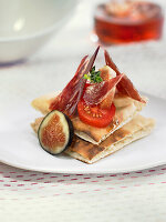 Montadito of Iberian ham with figs and cherry tomatoes