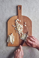 Celeriac being cut into small cubes