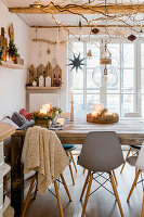 Rustic wooden dining table with Christmas decorations