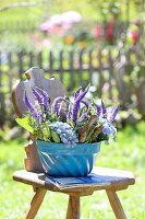 Vintage gugelhupfform with veronica, hydrangea, and birch twigs