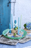 Candles with bows on birch branches