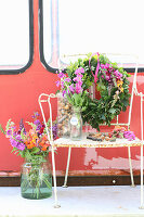 Bouquet of colorful flowers with snapdragons and Stocks and oak leaf wreath