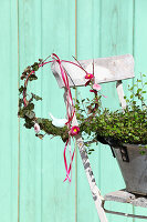 Spring wreath loop wreath with bellis, ivy, and moss