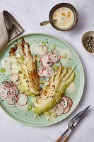 Braised pointed cabbage wedges with miso sesame dressing