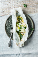 Cod cooked in parchment paper