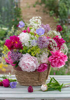 Summer bouquet of peonies, ornamental garlic, bellflowers, goutweed and lady's mantle